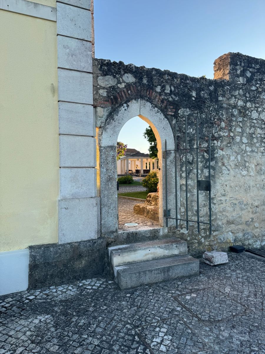 Stone archway in a historic courtyard