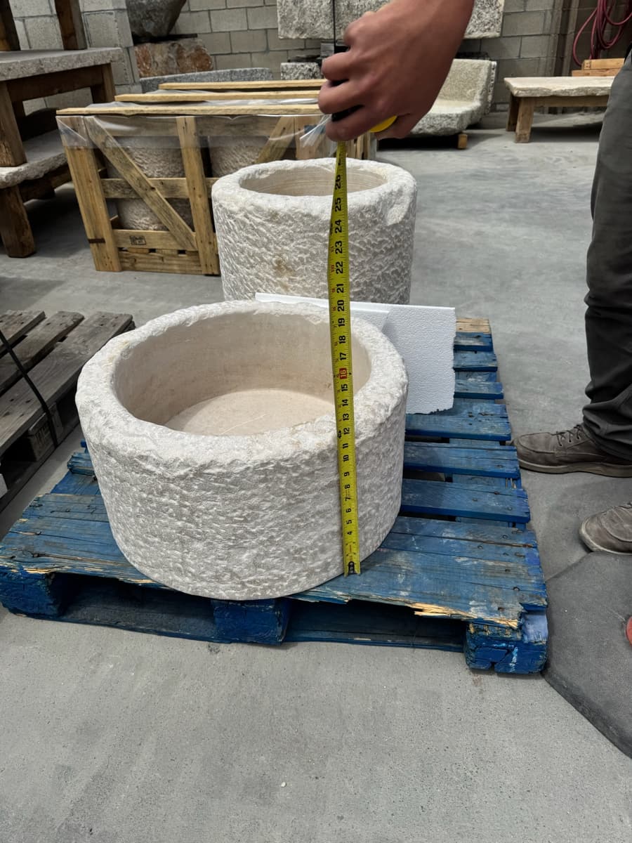 Carved stone basins measured on the pallet