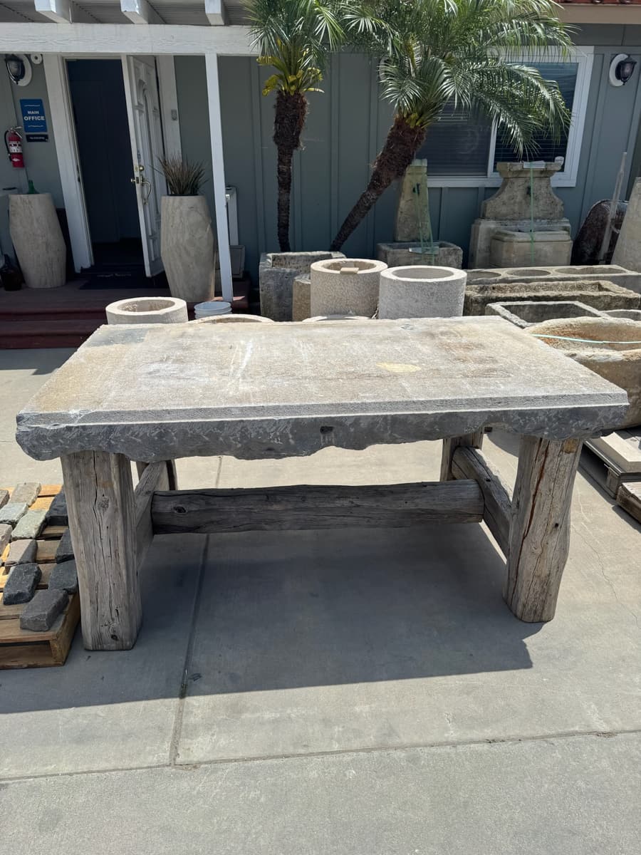 Stone-topped table on a timber base