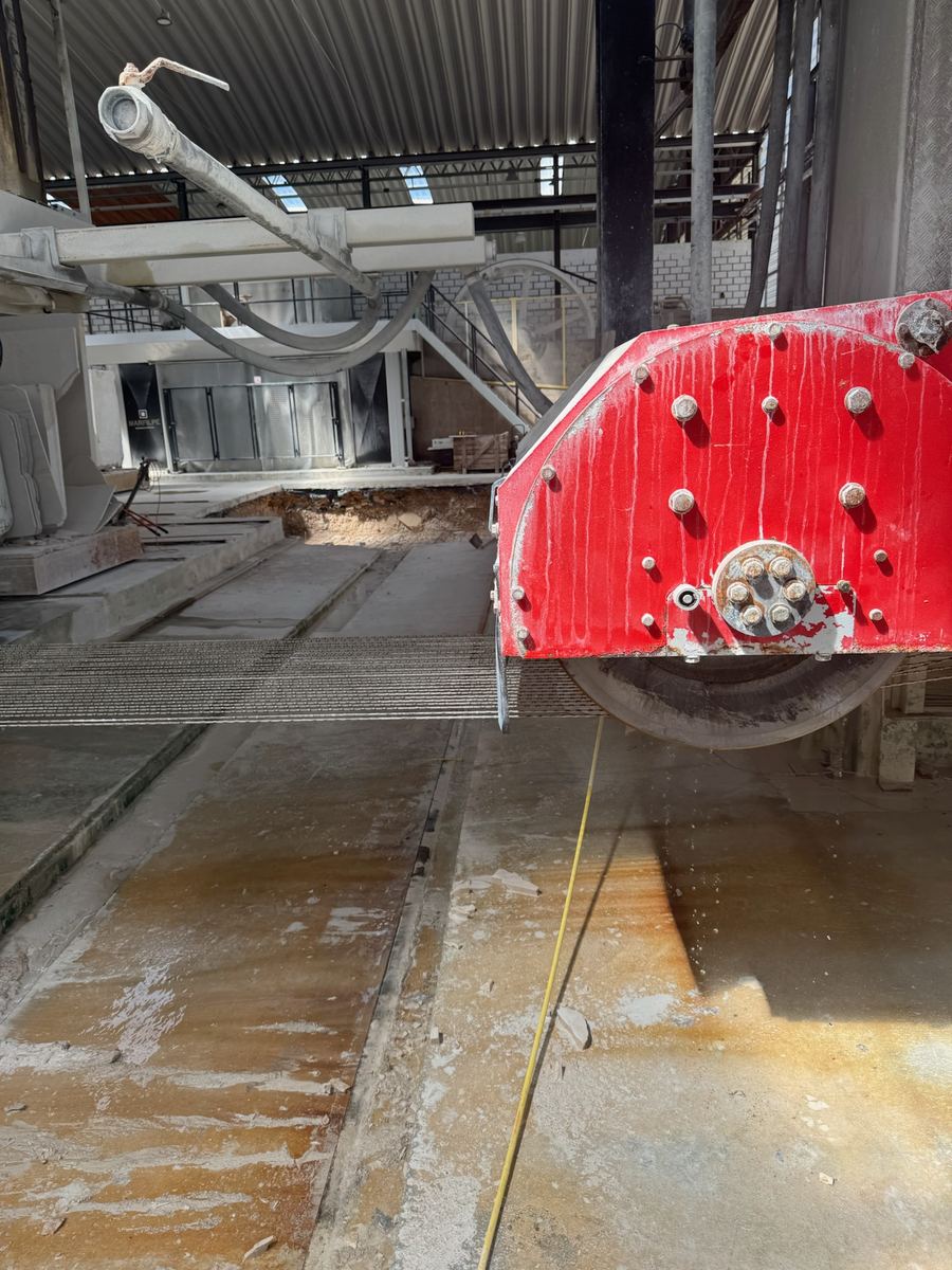 Block saw working through a marble block